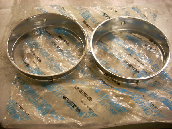 NOS Mazda Rx4 929 short nose front headlight crome rings